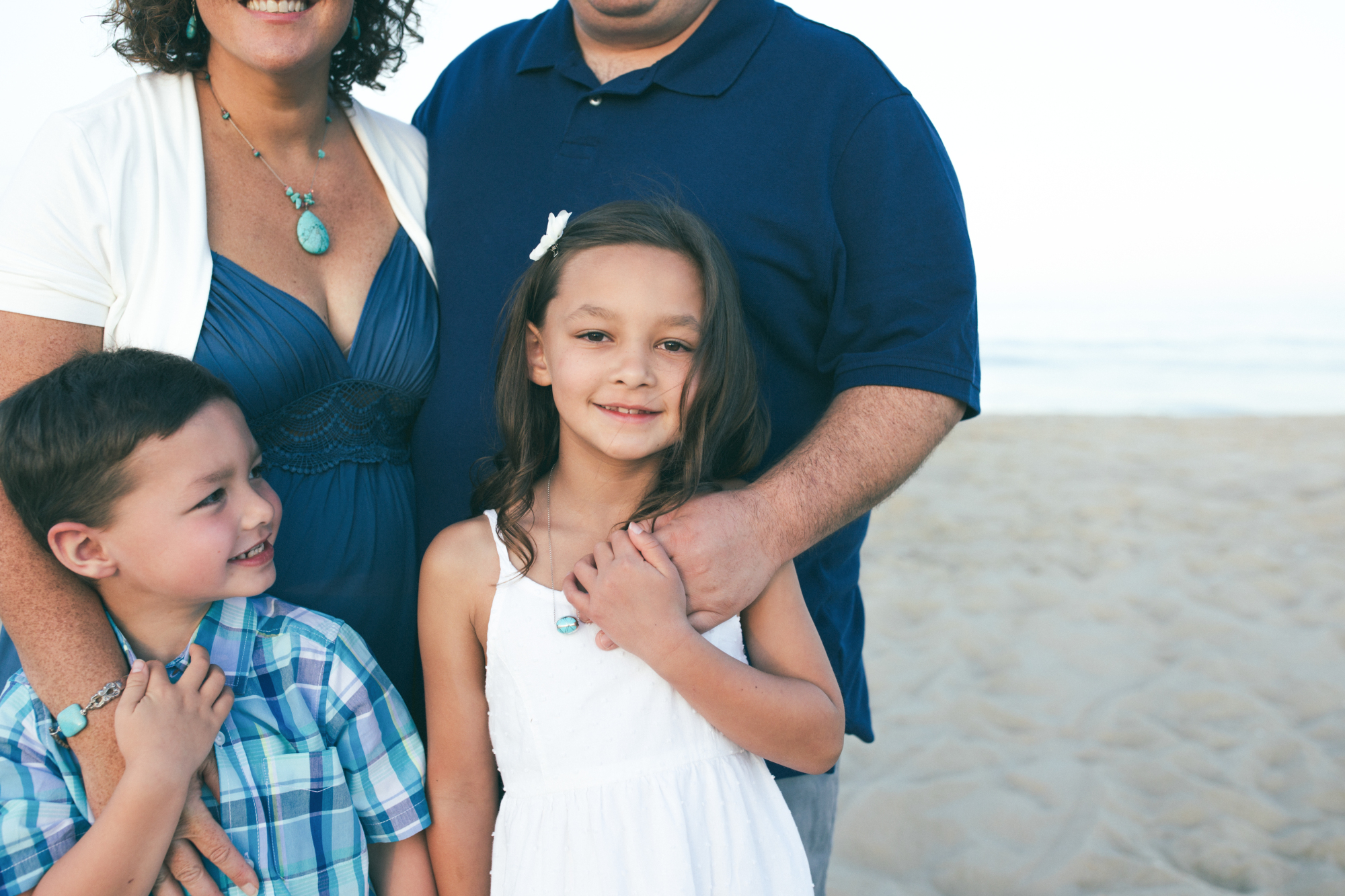 Family ocean walk on Dewey Beach