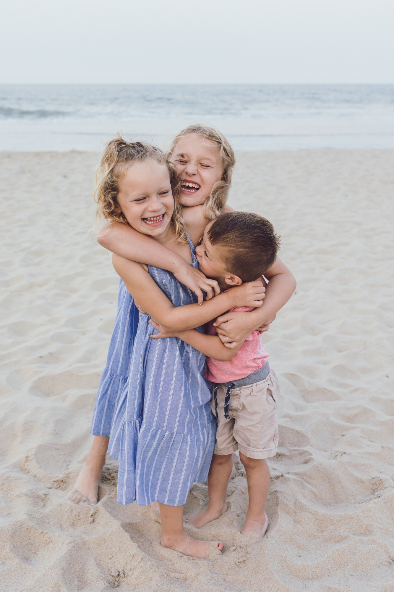 Sunset family session on Dewey Beach shore